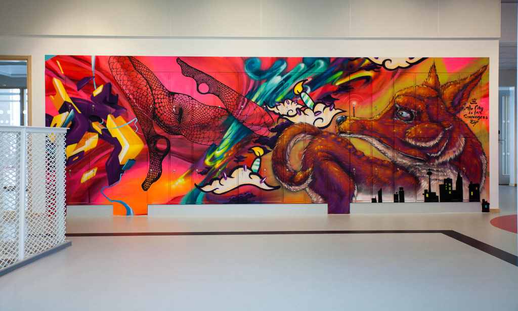 Pärra Andreasson (konstnärlig ledare), Vad Vi Vill, 2013. Graffiti i flera delar på skåp, med en total yta av 180 kvadratmeter. 22 graffitimålare från hela världen var inbjudna att bidra med sin egna, unika stil. För Söndrumsskolan i Halmstad.