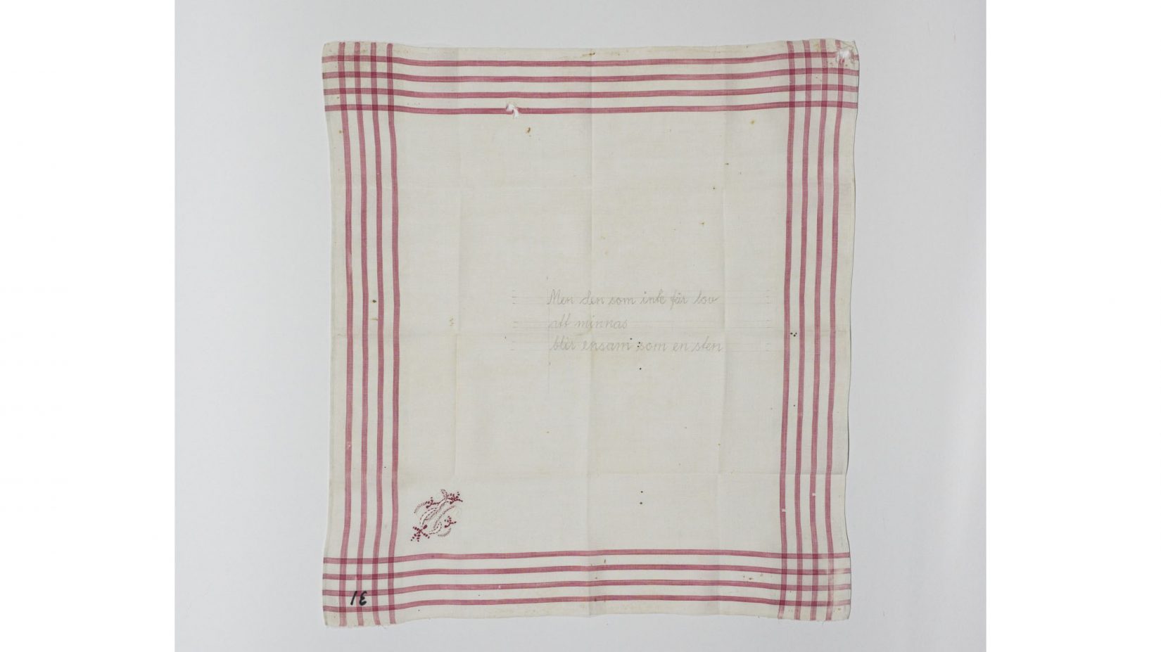 Näsduk med broderad text