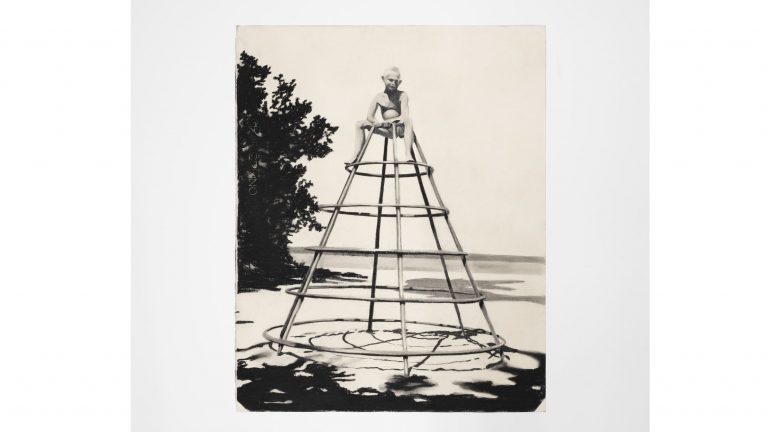 En tavla som avbildar ett barn på stranden