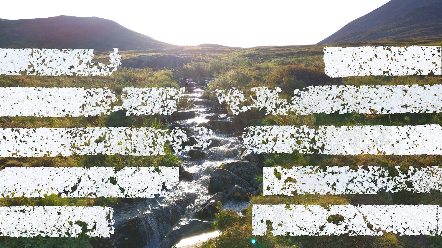 En fjällbäck och spruckna linjer