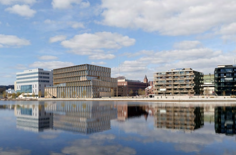 Skissbild på moderna byggnader vid vattnet