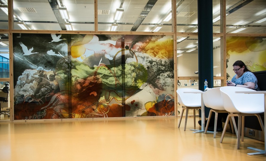 Large painting on a glass wall.
