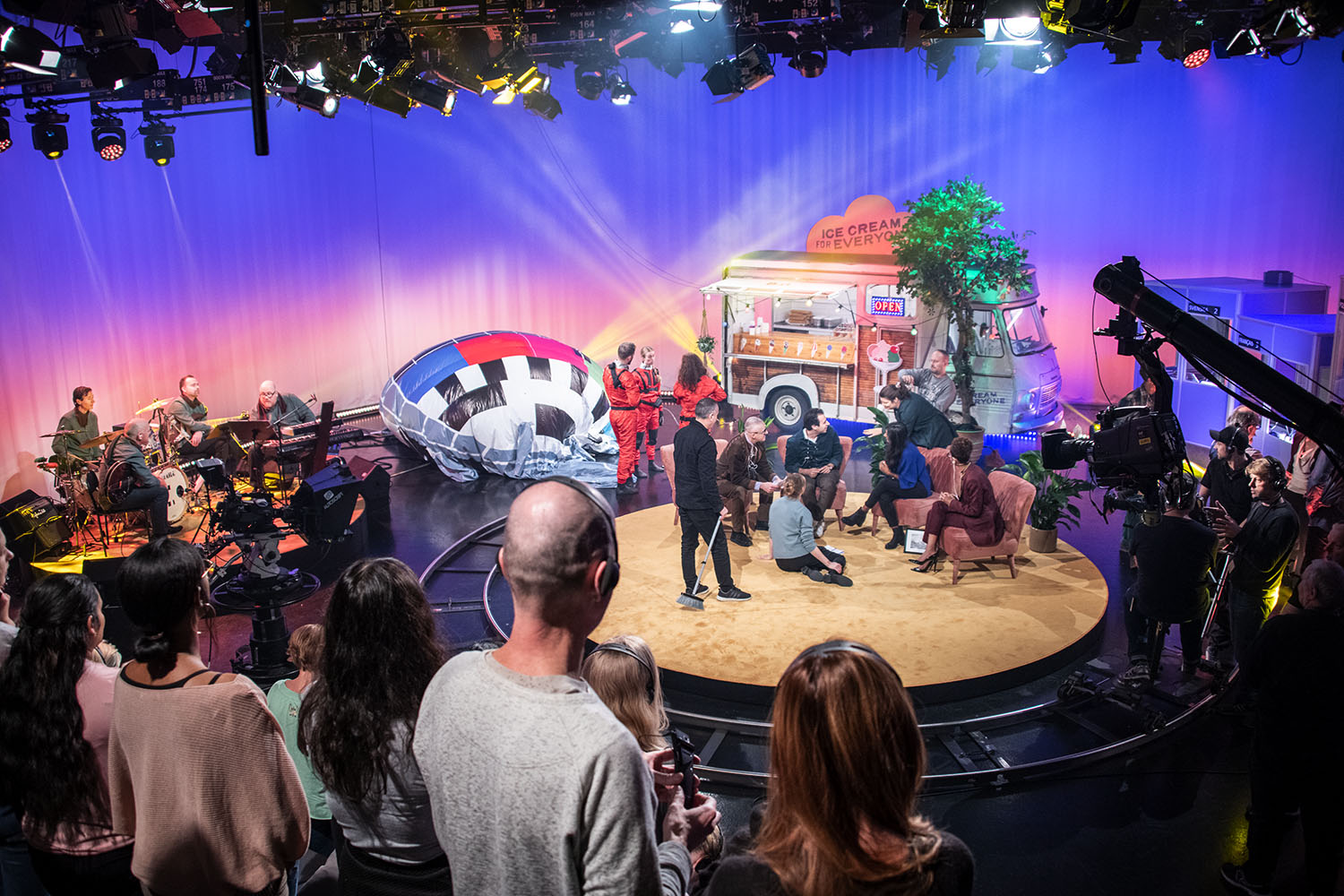 An audience watching a tv-show being recorded.